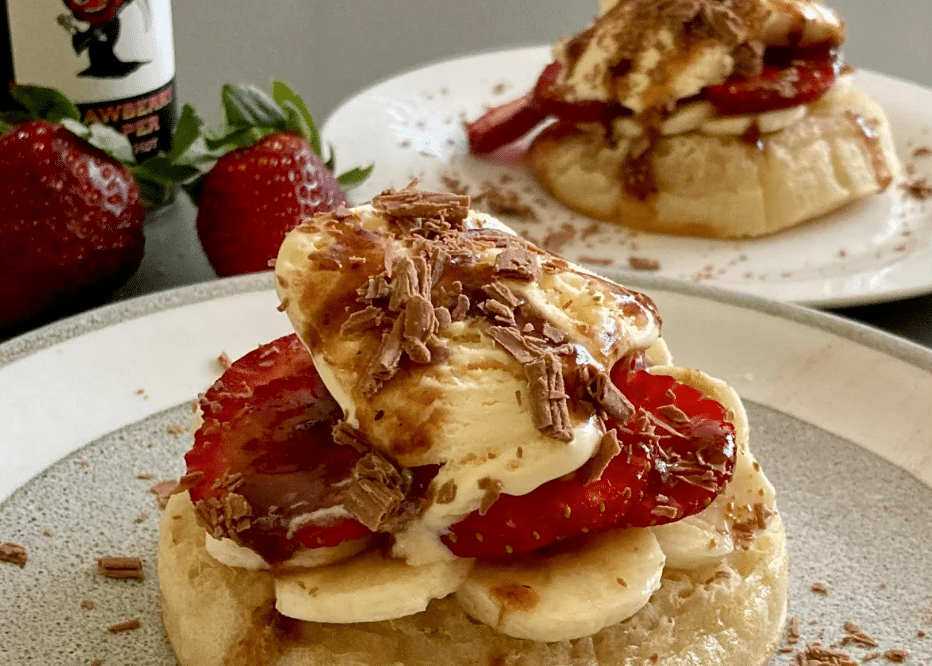 a tasty dessert stack with banana, strawberry and Bluey Zarzovs hot sauce